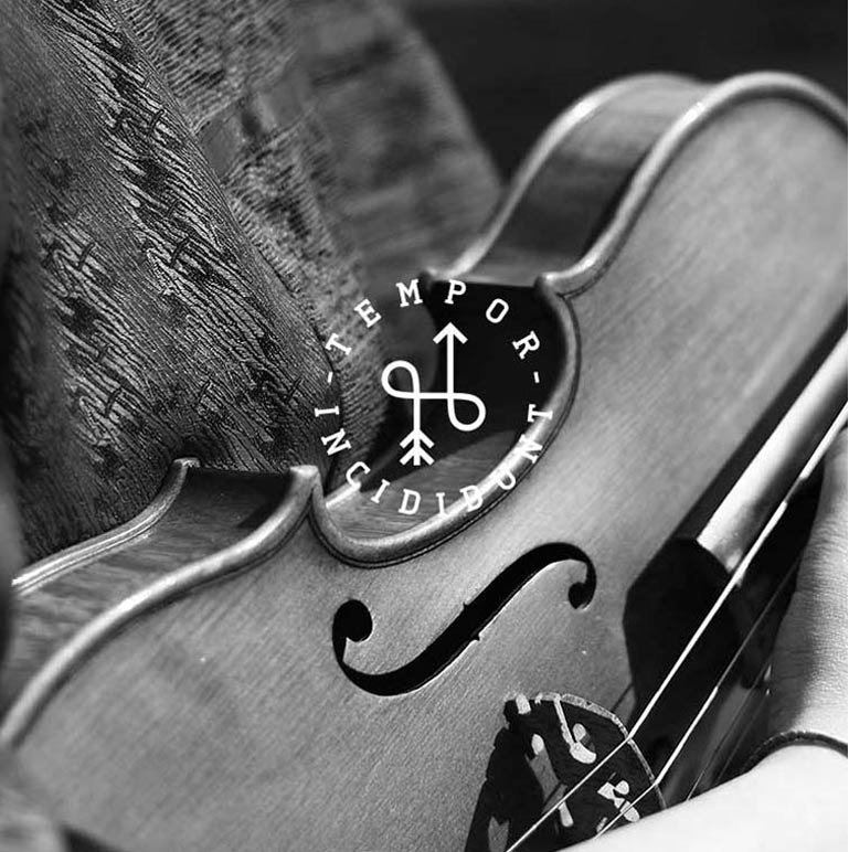 A violin with the symbol for the celtic cross on it.