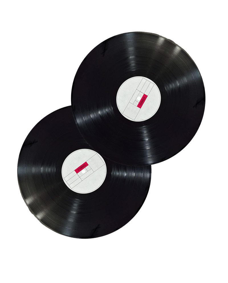 Two black records with white labels on top of each other.