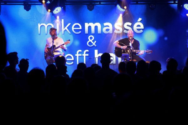 A group of people are performing on stage.