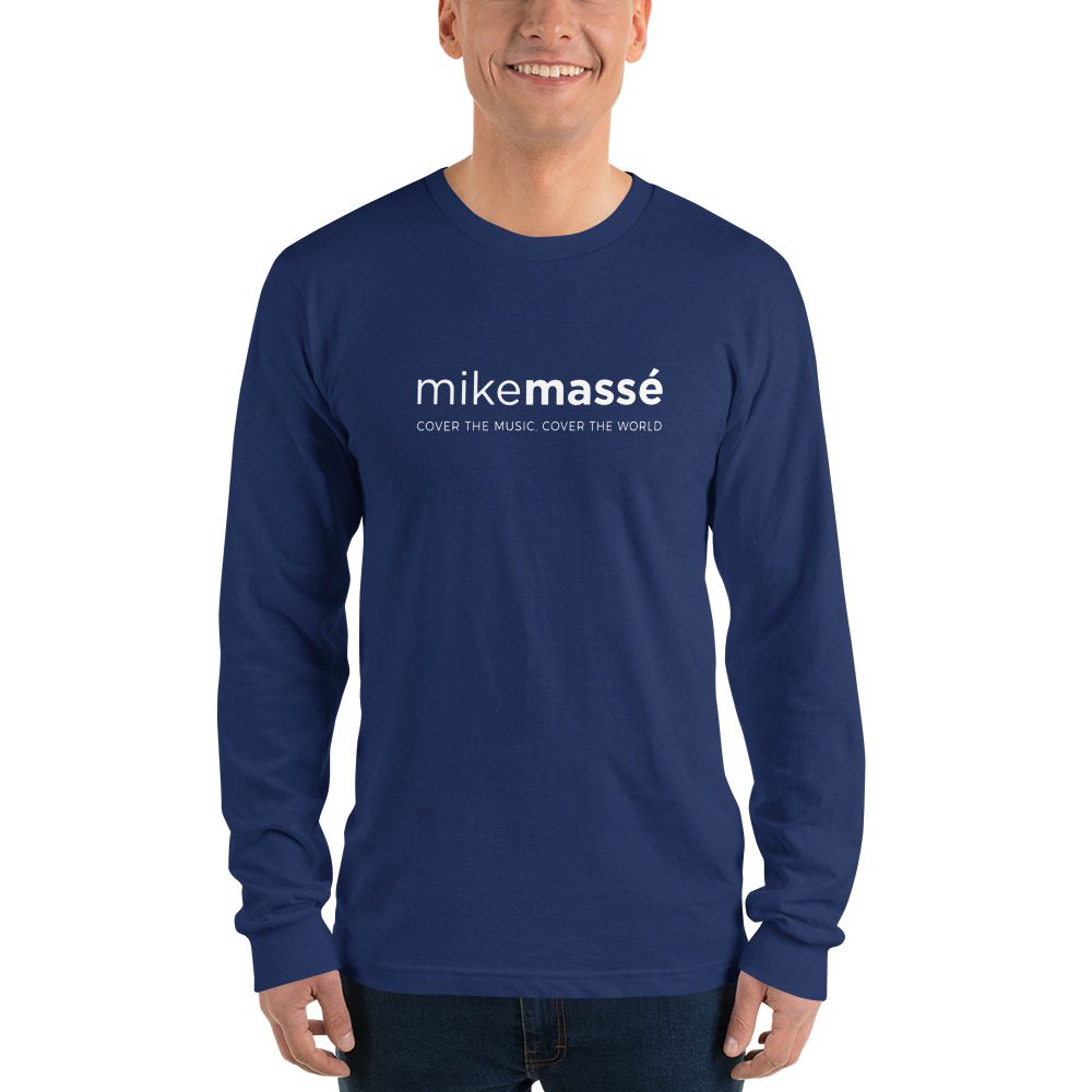A man wearing a long sleeve t-shirt with the name of mike massé.